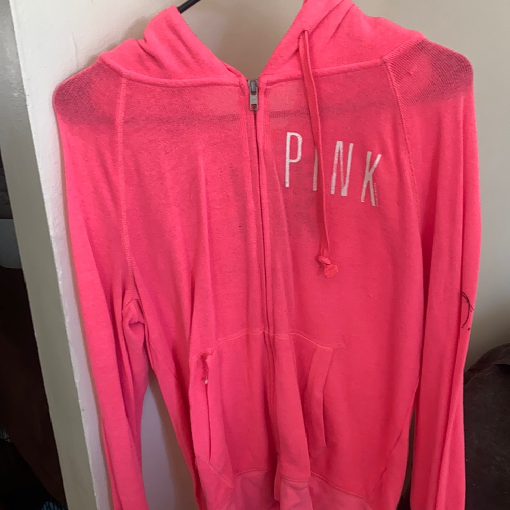 vs pink jacket with small tear
